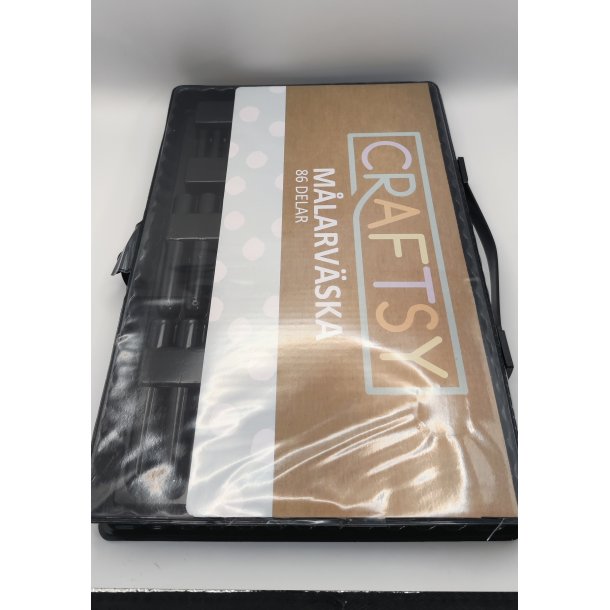 Stor, flot kuffert fyldt med tegne-/maleprodukter