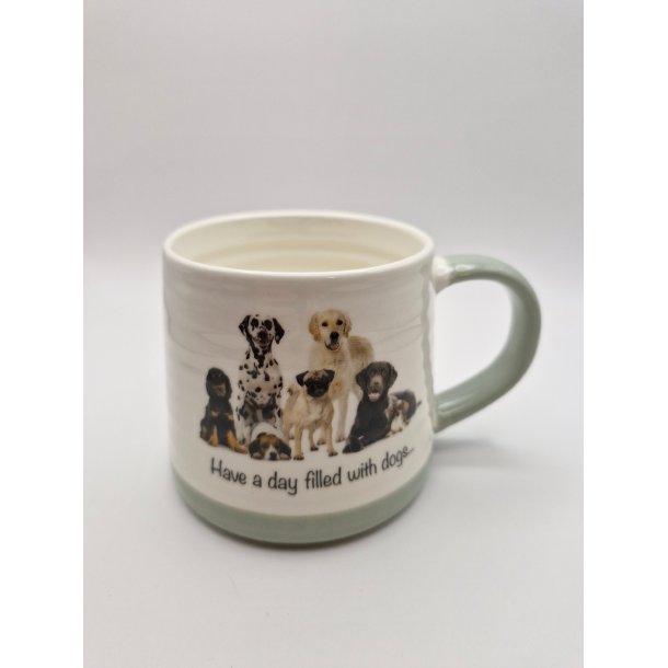 Kop med 7 forskellige hunderacer. Tekst: Have a day filled with dogs